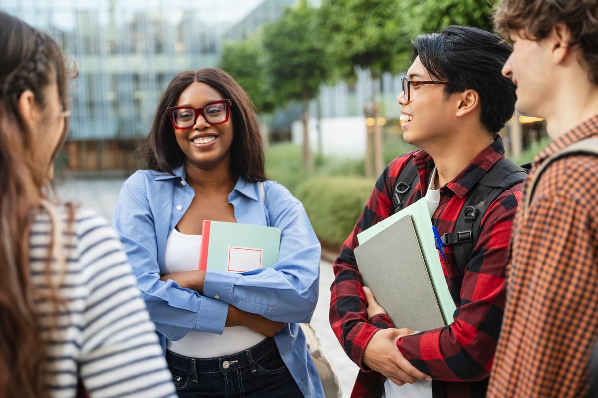 Exchange students meeting in front of a university campus — D-2-6 Exchange Student Visa Guide Hub